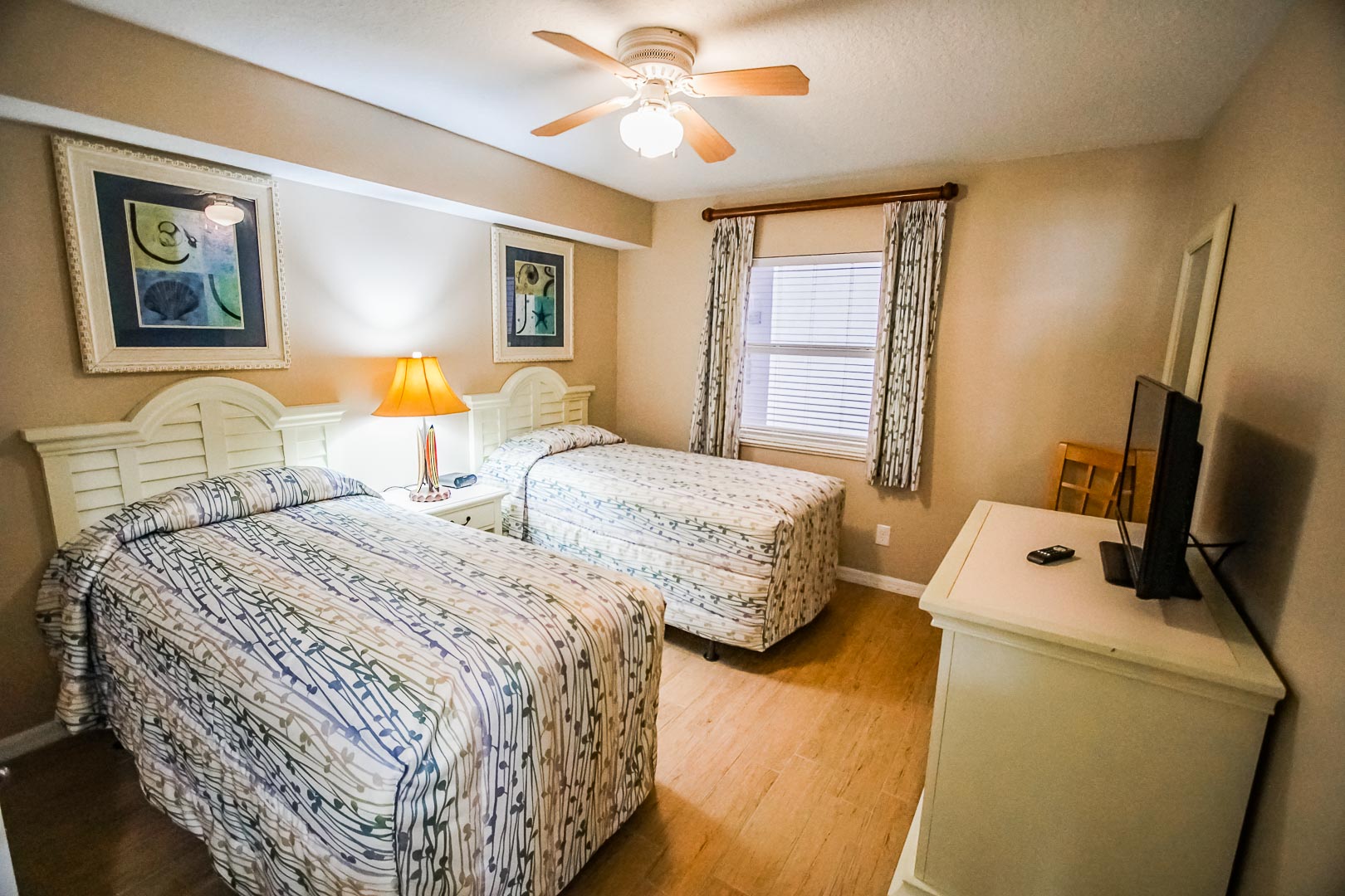 A spacious 2 bedroom unit with twin beds at VRI's The Resort on Cocoa Beach in Florida.